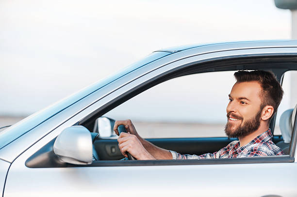 istock Riding his new car. 475336360