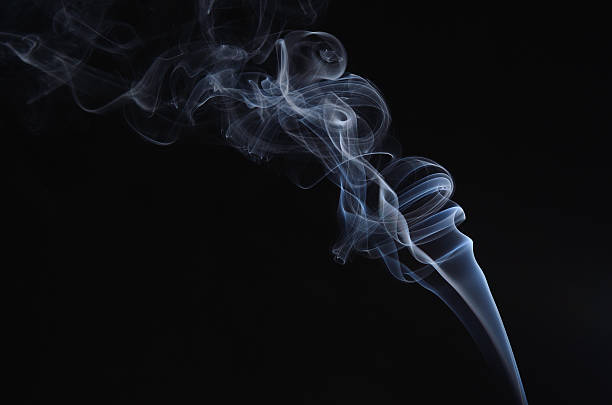 fumo su sfondo nero - mystics foto e immagini stock