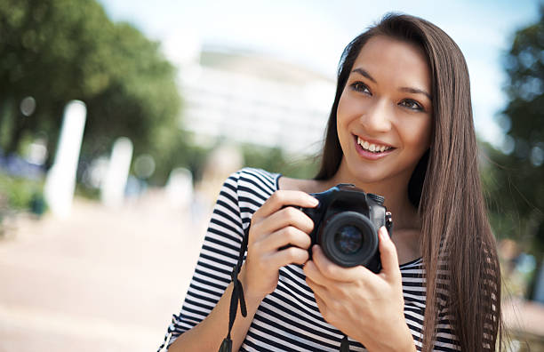 istock Her camera collects memories 475338492