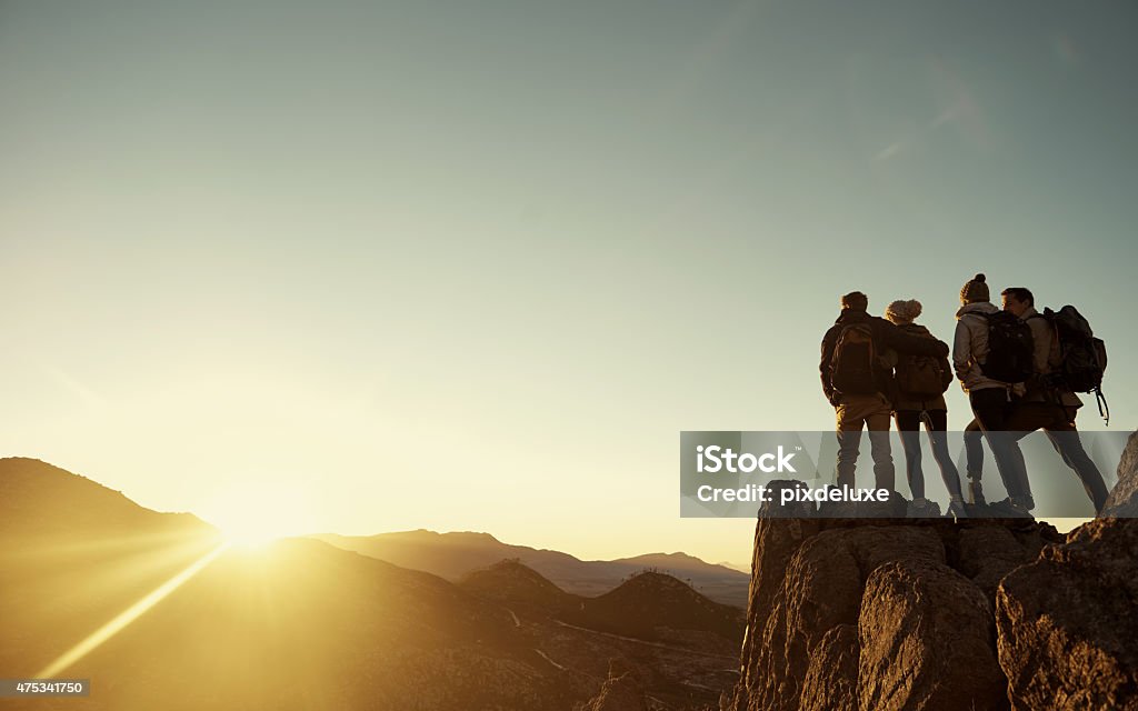 Another summit conquered Shot of a group of hikers on a rocky outcrop while out for an early morning walkhttp://195.154.178.81/DATA/i_collage/pu/shoots/804697.jpg 20-29 Years Stock Photo