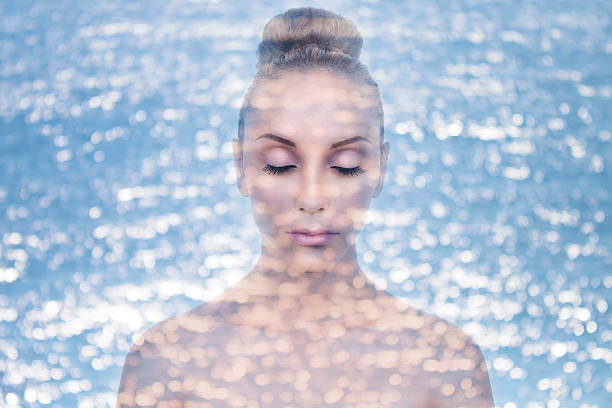 Double Exposure Woman Skin Moisturizer Double exposure of woman with water for skin moisturizer concept shower women falling water human face stock pictures, royalty-free photos & images