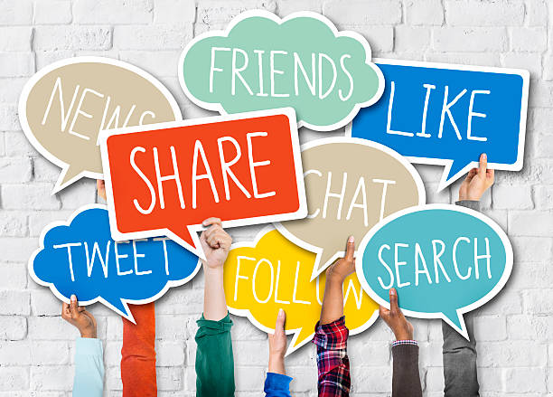 istock Diverse Hands Holding Colorful Speech Bubbles with Words 475345124