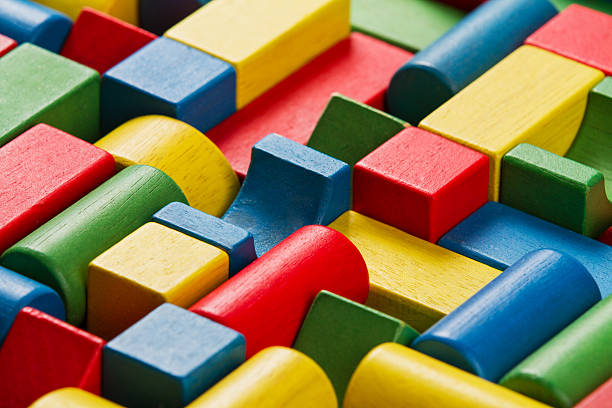 istock Toys blocks, multicolor wooden bricks, colorful building pieces 475345573