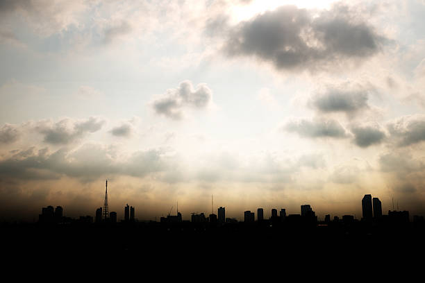 istock City silhouette in sun ray 475349620