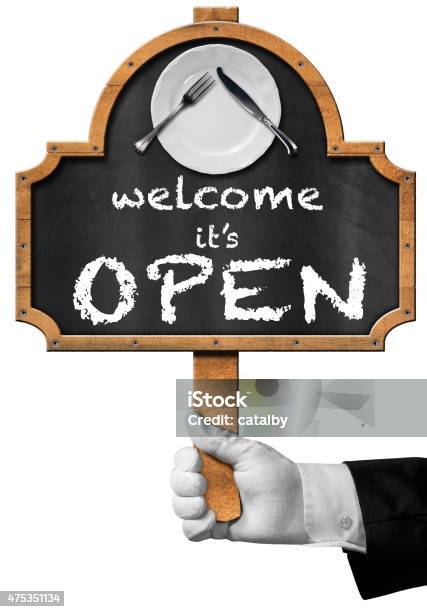 Welcome It Is Open Sign With Hand Of Waiter Stock Photo - Download Image Now - 2015, Advertisement, Banner - Sign