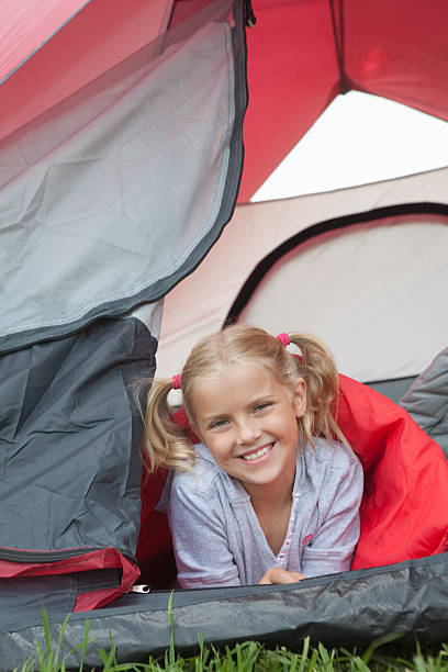 istock Little Girl Lying Inside Tent 475351763