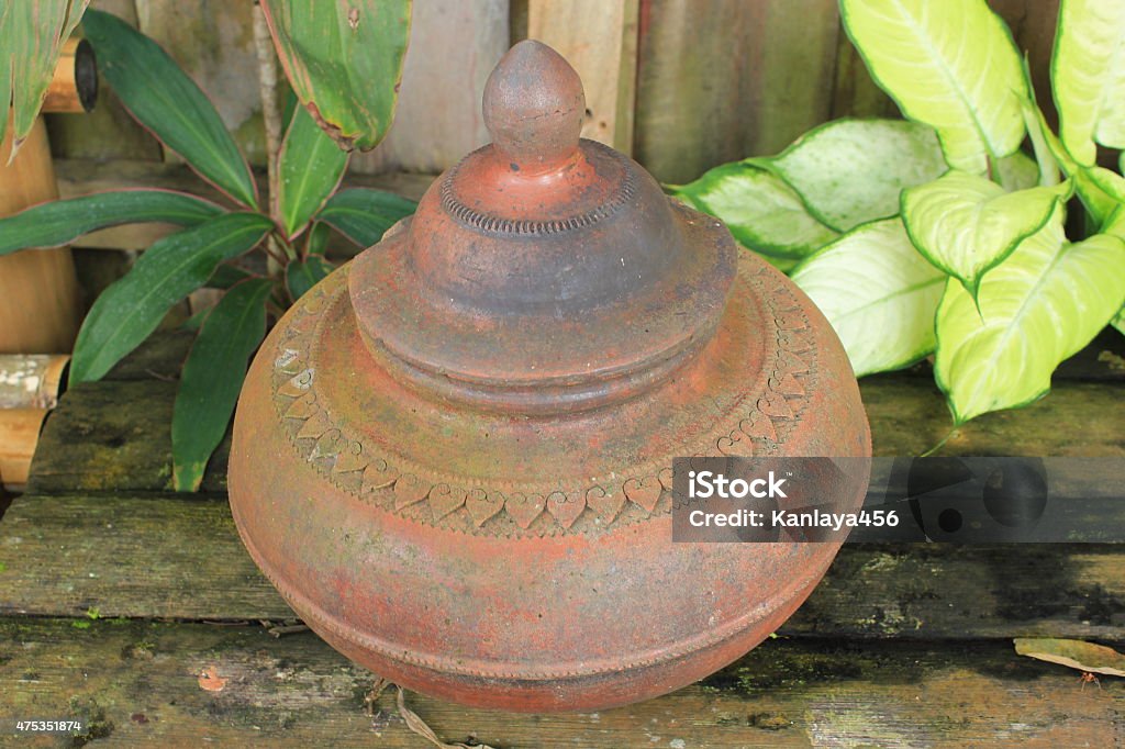 Jar of Ancient Water,thailand Clay pot on drinking water is the Thai way of life , lanna style. 2015 Stock Photo