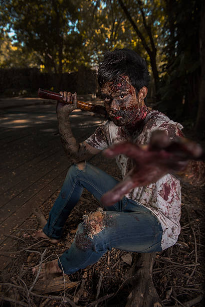 istock zombie in the haunted school 475359902