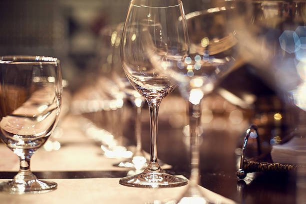 istock Close up picture of empty glasses in restaurant. Selective focus 475361128