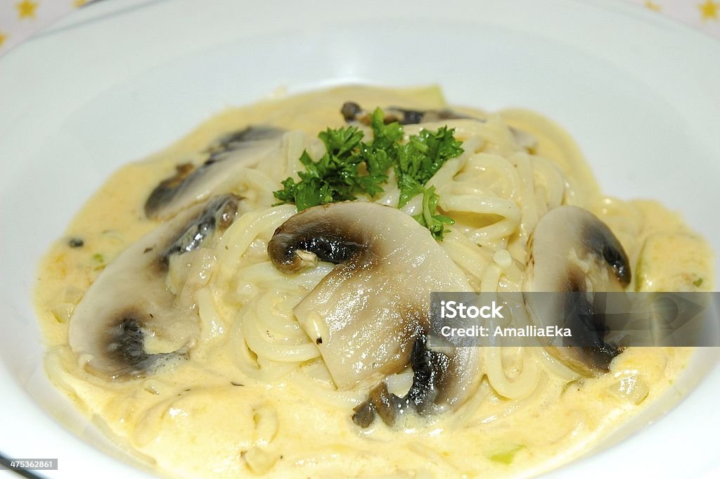 Spaghetti mushroom cheese sauce Spaghetti mushroom cheese sauce - close up Boiled Stock Photo