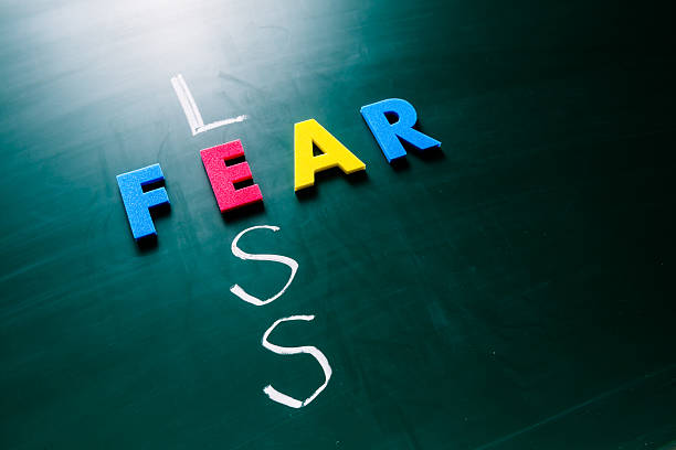 istock Less fear concept on blackboard 475365994