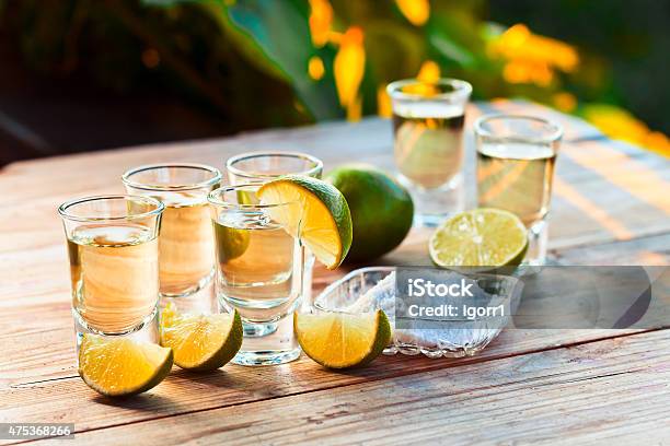 Gold Tequila With Salt And Lime Stock Photo - Download Image Now - 2015, Alcohol - Drink, Bar - Drink Establishment