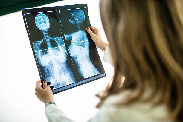 istock Pensive doctor looking the xray 475371006