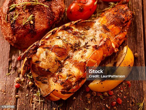 Bbq Grilled Lobster Tail And Steak Fillet Stock Photo - Download Image Now - Lobster - Seafood, Tail, Tail Fin