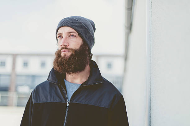 istock Thoughtful Man with Unshaven Beard Looking Up 475372868