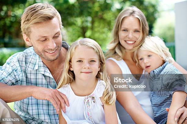 Hes So Proud Of His Little Family Stock Photo - Download Image Now - 30-39 Years, Adult, Affectionate