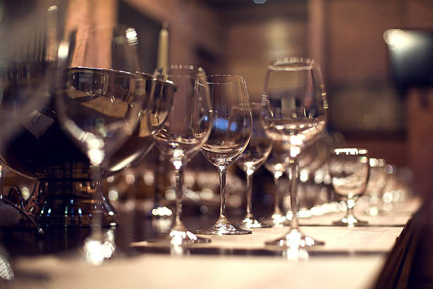 istock Close up picture of empty glasses in restaurant. Selective focus 475374336