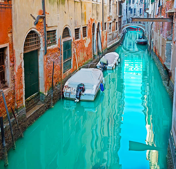 istock boats in a canal 475374377