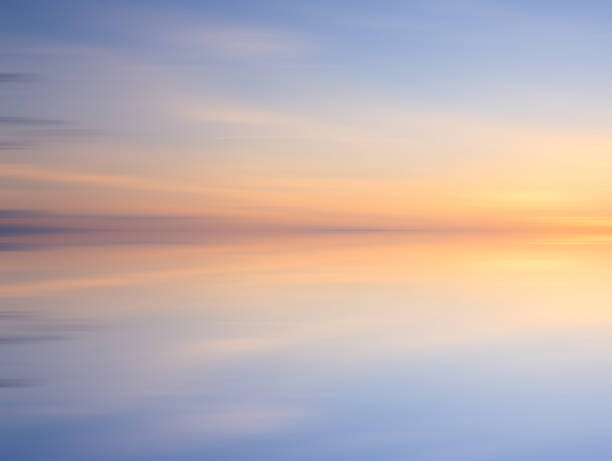istock Reflection of colorful sunset with long exposure effect, motion blurred 475379737