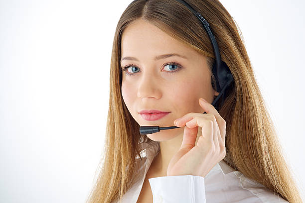 istock Portrait of woman phone operator with headset 475380337
