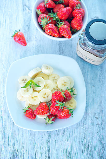 istock strawberry with banana 475381670