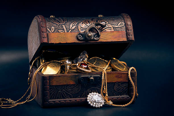 istock treasure chest with gold coins 475382098