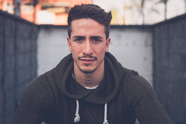 istock Young  man posing in an urban context 475382234
