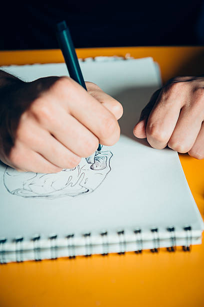 istock Tattoo Artist Drawing 475383490