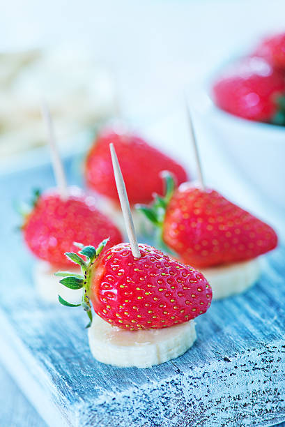 istock strawberry with banana 475383504