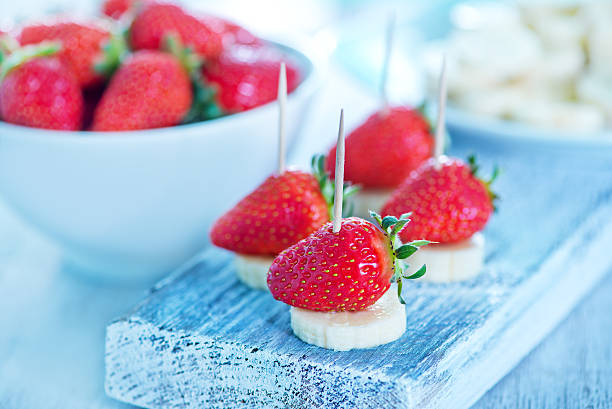 istock strawberry with banana 475383506