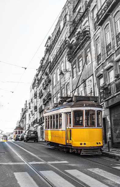 istock Yellow Tram in motion, Lisbon, Portugal 475383677