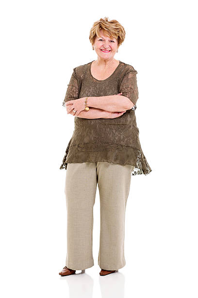istock senior woman with arms crossed 475385533