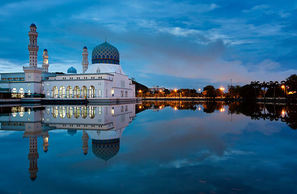 istock Reflection of Kota Kinabalu mosque at blue hour 475385631