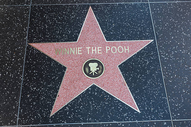Hollywood Walk of Fame Star Winnie The Pooh Los Angeles, USA - January 17, 2014:  The Hollywood Walk of Fame star of Winnie The Pooh located on Hollywood Blvd. that was awarded in 2006 for achievement in motion pictures. winnie the pooh photos stock pictures, royalty-free photos & images