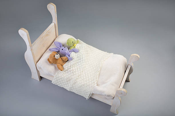 istock Plush toys in a bed 475386928