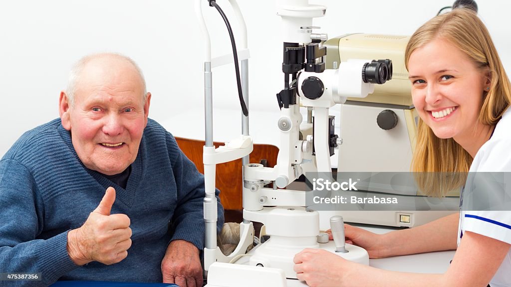 Senior Man With Presbyopia Happy senior man with presbyopia at an optical examination. 2015 Stock Photo