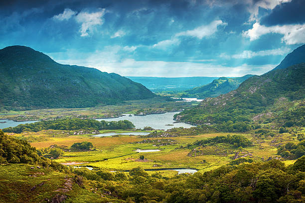 Gorgeous landscape in Ireland Morning shot about the Ladies View. Ladies View is a scenic point along the N71 portion of the Ring of Kerry, in Killarney National Park, Ireland. The name apparently stems from the admiration of the view given by Queen Victoria's ladies-in-waiting during their 1861 visit. killarney lake stock pictures, royalty-free photos & images