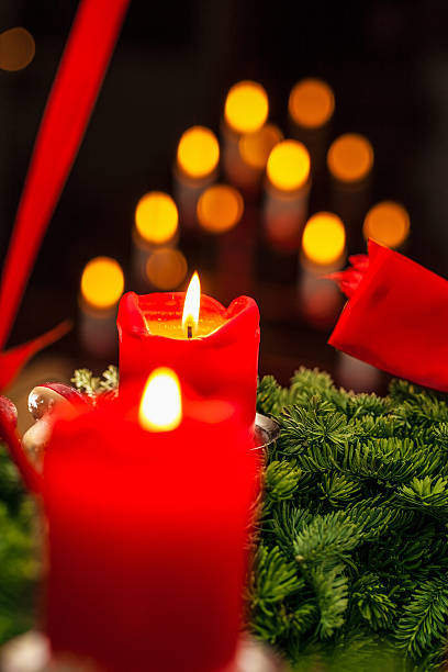 istock Christmas decoration with candles on pine branch 475389343