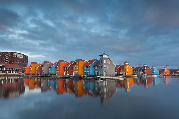 istock colorful buildings on water 475390449