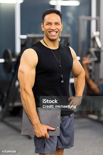 Muscular Male Gym Trainer Stock Photo - Download Image Now - 2015, Active Lifestyle, Adult