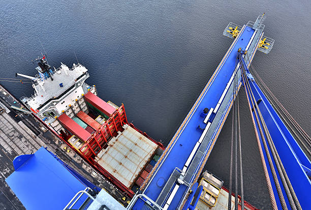 istock Cargo cranes in the port 475391898