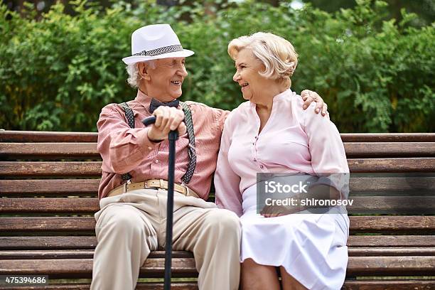 Seniors On Bench Stock Photo - Download Image Now - 2015, Active Seniors, Adult