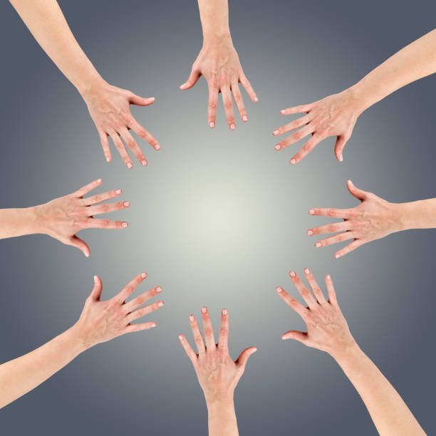 istock Group of eight hands at the circle together teamwork 475395078