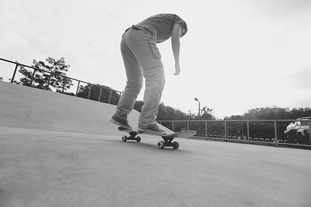 istock skateboarding  at skatepark 475396180