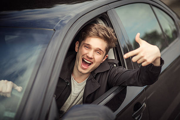 istock The young man behind the wheel,  traveling 475396806