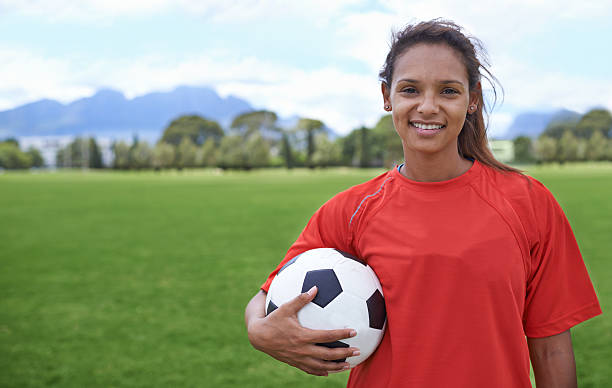 istock Soccer - she loves the game! 475397903