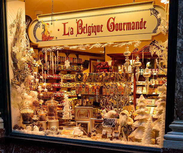 Brussels, Belgium- June 30, 2016: People standing in front of the chocolate shop in Brussels. There is too much choice...