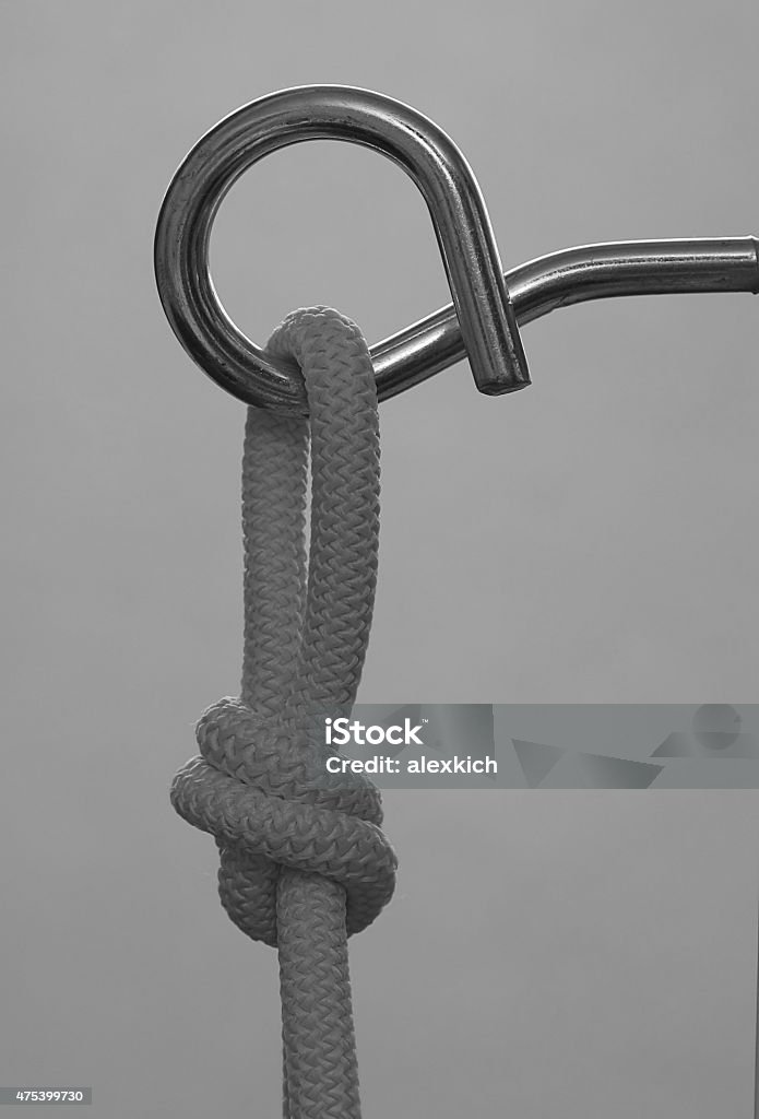 Climbing Hook With Rope Knot Insurance Stock Photo - Download