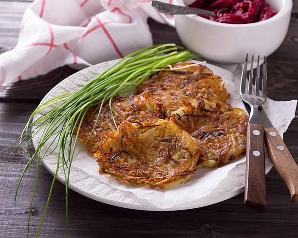 istock Potato fritters with red onion and spices 475405634