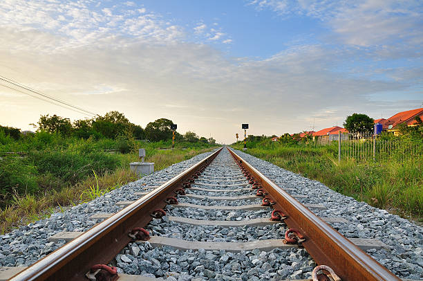 istock railroad to horizon under cloudy sky 475406091